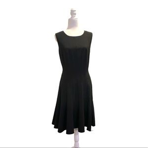 Calvin Klein sleeveless black dress, lined.